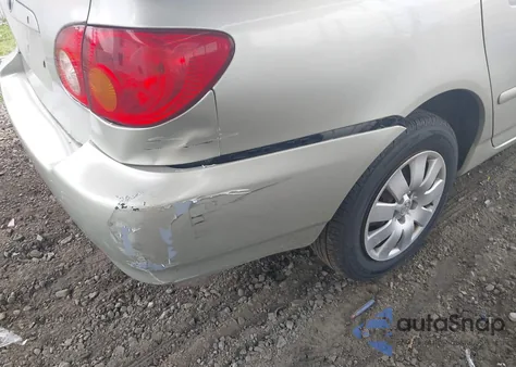 2003 Toyota Corolla Le z USA, uszkodzony, nr VIN JTDBR32EX30047579